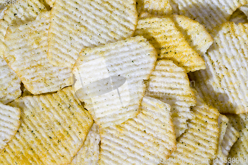 Image of chips on a wooden table