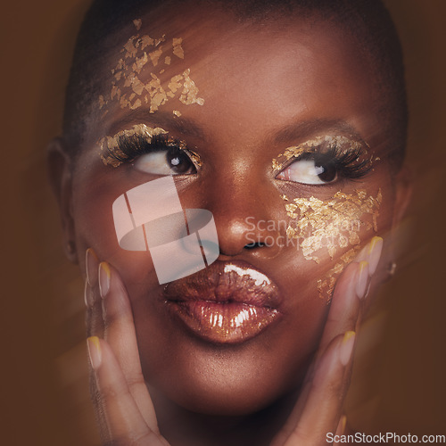 Image of Art, motion of black woman with gold makeup and blurred background, glitter paint and cosmetics. Shine, glow and African model in studio for beauty, fashion and aesthetic freedom in luxury skincare.