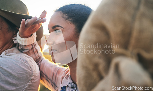 Image of Farm harvest, woman closeup and countryside watching with working on a grass field with grain bag. Sustainability, eco friendly and agriculture outdoor in nature with farmer management mission