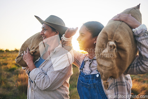 Image of Farm harvest, women and countryside with a smile from working on a grass field with grain bag. Sustainability, eco friendly and agriculture outdoor at sunset in nature with farmer management mission