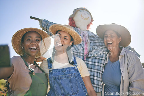 Image of Women, agriculture and group selfie in summer with smile, scarecrow or funny memory for web blog in farming. Female teamwork, agro job and photography in nature, happy and comic laugh on social media