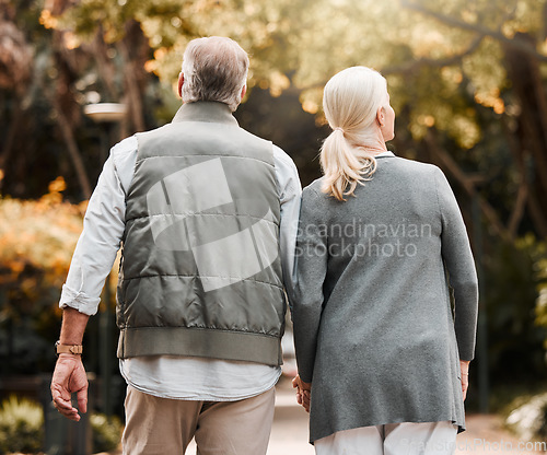 Image of Holding hands, love and back with old couple in nature for bonding, happy and support. Relax, happiness and retirement with senior man and woman walking in countryside for vacation and commitment