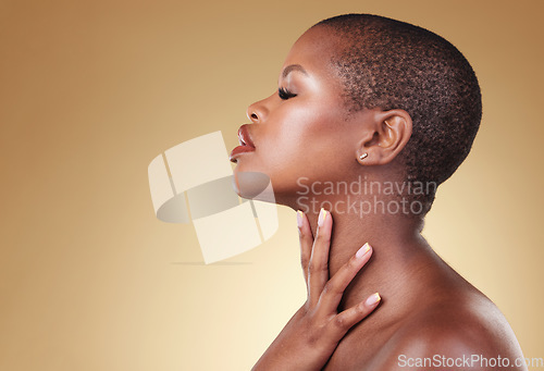 Image of Face, beauty and makeup of a black woman in studio for self care, skin glow or cosmetics. Profile of African aesthetic model person with facial shine, dermatology and mockup space on beige background