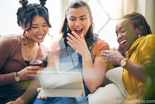 Image of Home, friends and women with a tablet, funny and social media with connection, news and communication. Mobile app, group and female people with technology, laughing and online reading in a lounge