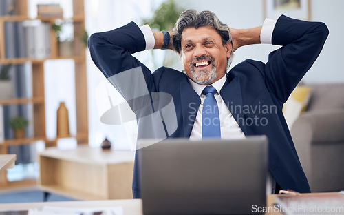 Image of Business, relax and man with a laptop, smile and finance with connection, feedback and investment. Person, investor and hedge fund manager with a pc, hands behind head and stock market with profit