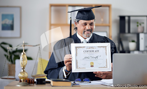 Image of Laptop, video call and certificate with a man judge in his office, proud of an award as a law degree graduate. Computer, virtual and success with a mature legal student showing his prize to a webcam