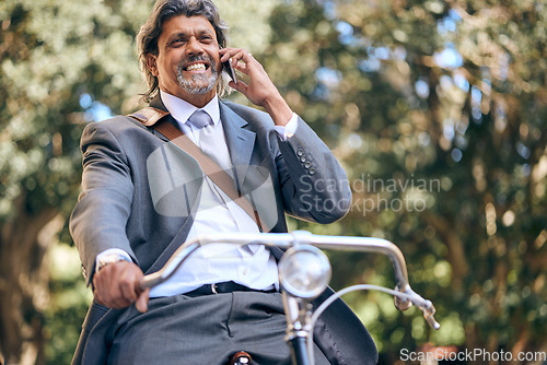 Image of Business man, bicycle and phone call in street, park and outdoor for networking, conversation and negotiation. Mature entrepreneur, bike and smartphone with chat, thinking and eco friendly travel