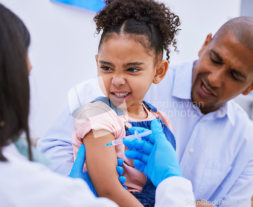 Image of Scared child, dad and doctor with vaccine in syringe, flu shot or medicine injection in clinic or hospital. Father, girl in pain and pediatrician in office with needle vaccination at consultation.