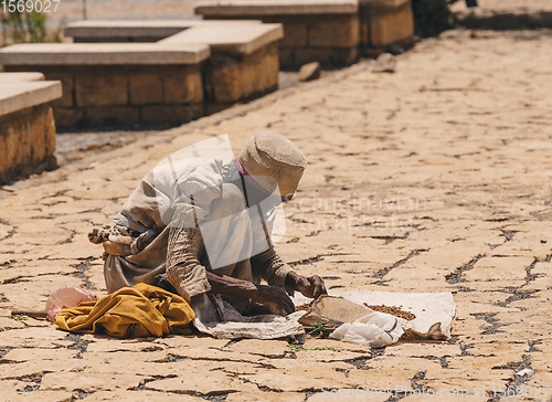 Image of Old woman sell incense in Aksum, Ethiopia Africa