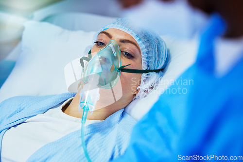 Image of Hospital, anesthesia and woman with oxygen mask in surgery for medical service, operation and procedure. Healthcare, doctor and surgeons with gas, breathing and ventilation equipment for patient