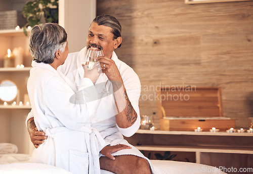 Image of Anniversary, spa and senior couple with love, celebration and bonding with champagne, marriage and romantic retreat. Mature woman, old man and relax with alcohol glass, relationship and happiness