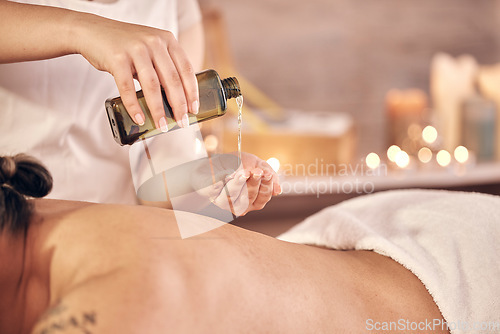 Image of Spa therapy, massage oil and man with luxury care, wellness and muscle relax with hands, stress relief and peace. Zen hospitality, person and client with treatment, beauty salon and calm on holiday