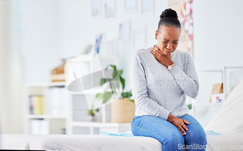 Image of Black woman, sick and throat virus on bed at hospital waiting for doctor in checkup, visit or appointment. Frustrated African female person or patient with sore neck, infection or cough at the clinic