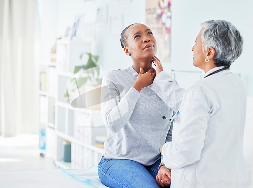 Image of Patient, doctor and hospital for sore throat of woman for virus, pain or infection. Healthcare worker and sick African person show neck for thyroid, examination or respiratory at medical consultation