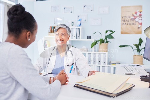 Image of Doctor, patient and talking at happy consultation in hospital with a woman for medical advice. Healthcare worker and person for conversation, results and communication about wellness and health