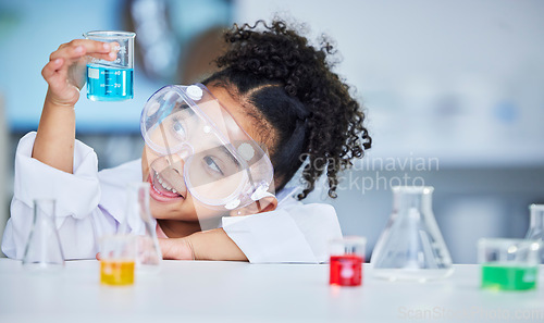 Image of Science, eduction and smile with child in laboratory for experiment, learning and research. Future, study and knowledge with face of young girl and chemicals for results, medicine and analysis