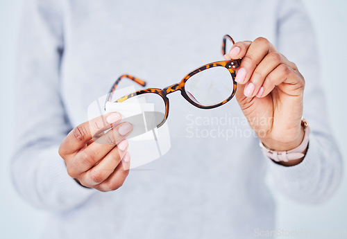 Image of Hands, cleaning lens and glasses, hygiene and vision with eye care and health, wipe and dust with pattern frame. Optometry, visual and person with eyewear, maintenance and wellness with improvement