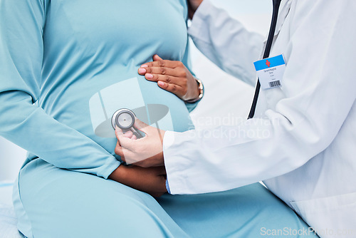 Image of Pregnant woman, doctor hands and stethoscope in hospital consulting, gynecology services or listening for baby. Mother stomach, abdomen and pregnancy, medical gynecologist or people in clinic support