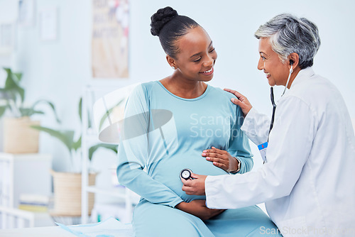 Image of Black woman, pregnant and doctor listening to heart beat in checkup, appointment or visit at hospital. Happy African female person in maternity and mature medical or healthcare professional at clinic