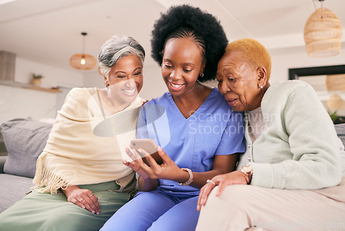 Image of Phone, caregiver and elderly women on sofa to browse internet, telehealth and mobile app together. Retirement, nursing home and nurse with senior people on smartphone for medical result or report