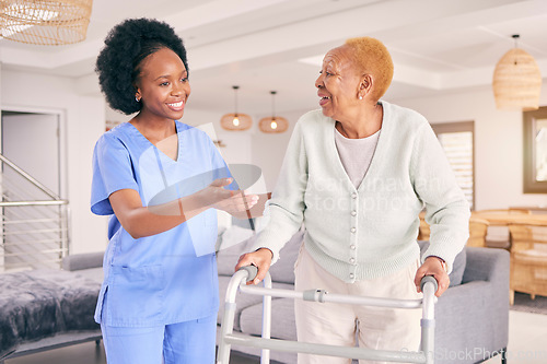 Image of Doctor, elderly woman and walking frame for support, healthcare service and nursing or caregiver helping. Medical physiotherapy, happy nurse and senior african patient with disability in living room