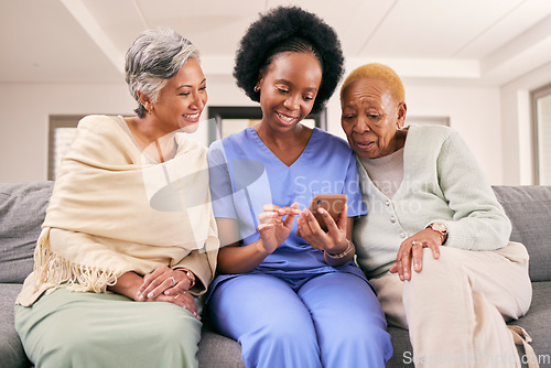 Image of Phone, caregiver and senior women on sofa to browse internet, telehealth and mobile app together. Retirement, nursing home and nurse with elderly people on smartphone for medical result or report