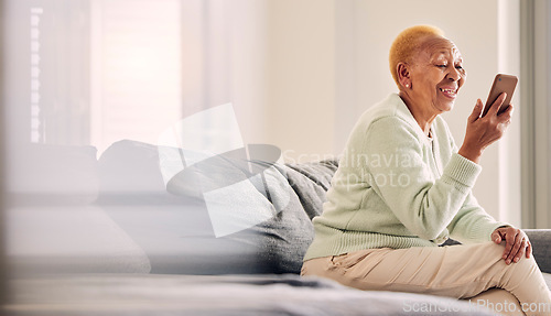 Image of Video call, senior woman audio and living room with conversation and communication in a home. Retirement, African elderly female person and mobile discussion on a sofa with contact and mockup space