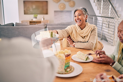 Image of Happy, cake and senior friends at a home for a tea party having fun together in retirement. Smile, happiness and elderly female person dish dessert or sweet snack by the dining room table at home.