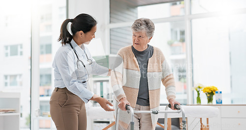 Image of Physical therapy, walker or doctor nursing old woman in retirement or hospital for wellness or support. Exercise, caregiver helping or elderly patient learning with walking frame in rehabilitation