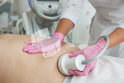 Image of Belly cavitation at modern beauty clinic