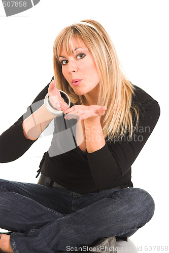 Image of woman sending a kiss