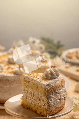 Image of Nut cake with whipped cream