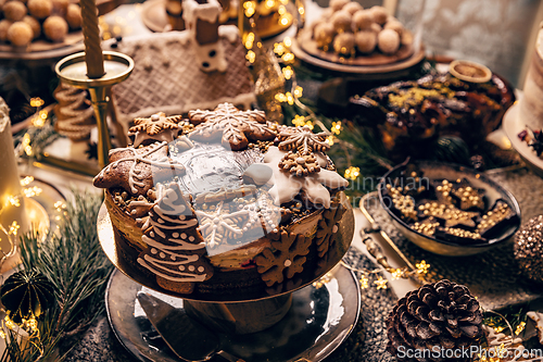 Image of Fancy table fulfilled with Christmas desserts