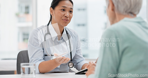 Image of Medical consultation, tablet and senior woman, doctor and talk to patient, explain hospital services or healthcare insurance. Chat, results or cardiology worker consulting, advice or help old person