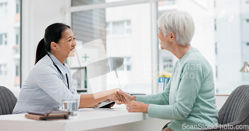 Image of Doctor handshake, senior woman and healthcare with thank you in a hospital for medical care. Elderly consultation, smile and insurance conversation with women in a clinic office for retirement advice