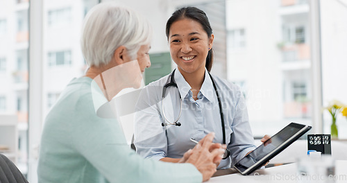 Image of Talking, doctor or elderly patient with tablet for results, digital report or health report history online in hospital. Medical, healthcare or nurse with advice, news update or support for old woman