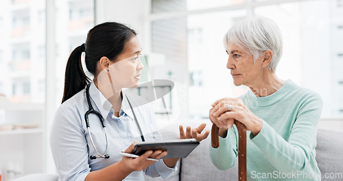 Image of Talking, old woman or doctor with tablet for results, report or report history online in hospital in consultation. Support, healthcare or Asian nurse with medical update for elderly patient in clinic