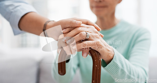 Image of Senior woman, walking cane and holding hands of nurse with healthcare support for retirement. Caregiver, elderly female person and empathy with care and nursing of patient with help in a home