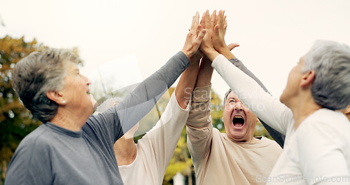 Image of High five, support and a group of senior friends together in a park for motivation, success or celebration. Team building, partnership and community with elderly people bonding outdoor in a garden