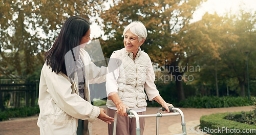 Image of Park, walker and woman help senior walking as support, trust and care for morning healthcare exercise or workout. Health, physical therapy and elderly with caregiver for outdoor rehabilitation