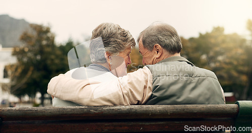 Image of Forehead, touch and senior couple in a park with love, happy and conversation with romantic bonding. Fun, old people and elderly man embrace woman with care, romance or soulmate connection outdoor