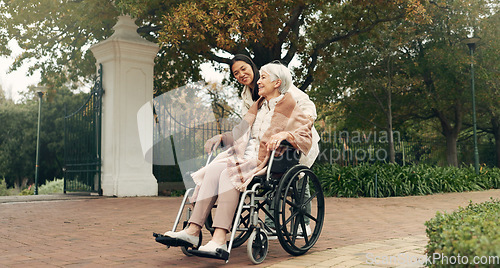 Image of Senior woman, wheelchair and caregiver in park, nature or garden outdoor together. Happy, elderly person with a disability and walking for health, wellness and physical therapy for rehabilitation