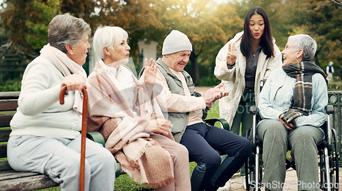 Image of Friends, happy and senior people in park for bonding, conversation and quality time together outdoors. Friendship, retirement and elderly man and women with caregiver on bench for relaxing in nature