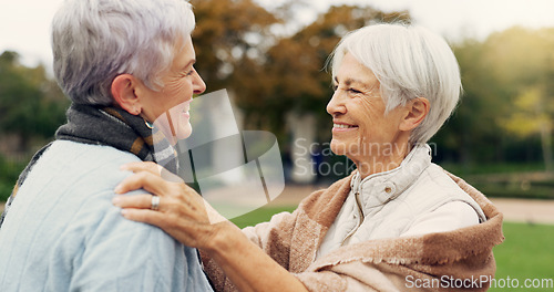 Image of Love, care and senior women embracing for affection, romance and bonding on an outdoor date. Nature, commitment and elderly female couple in retirement hugging in a green garden or park together.