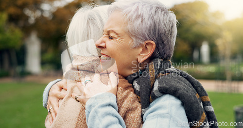 Image of Love, connection and elderly women hugging for affection, romance and bonding on an outdoor date. Nature, commitment and senior female couple in retirement with intimate moment in a garden or park.