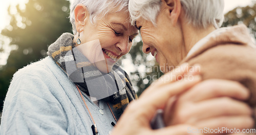 Image of Love, connection and senior women being affection for romance and bonding on an outdoor date. Nature, commitment and elderly female couple in retirement with intimate moment in a green garden or park