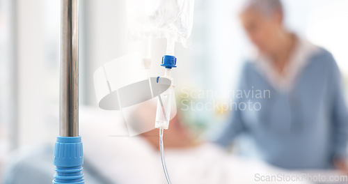 Image of Hospital, iv drip and bag for medicine, healthcare and nutrition with couple in clinic. Intravenous liquid, water and saline solution for infusion, healing and recovery, rehabilitation and wellness