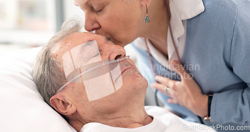 Image of Drip, hospital bed and senior man sleeping with ventilation and breathing tube in a clinic. Elderly patient, medical care and wife support with male person at a doctor for wellness and healthcare