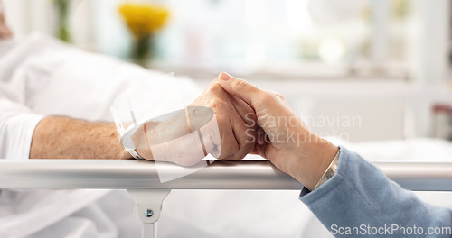 Image of Hospital bed, support and senior couple holding hands, trust or comfort sick partner with healthcare problem. Bedroom, marriage love or elderly people care for mental health patient with medical risk