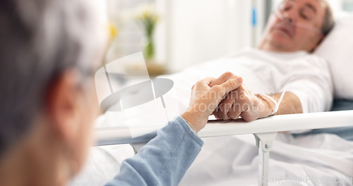 Image of Hospital bed, love and senior couple holding hands, trust and support sick partner, husband or man with healthcare problem. Bedroom, marriage kindness and elderly woman care for mental health patient